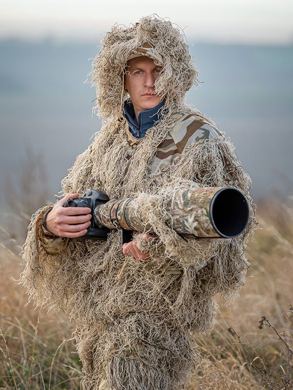 wildlife-photographer-in-the-ghillie-suit-working-LHJBDC9c.jpg wildlife-photographer-in-the-ghillie-suit-working-LHJBDC9c.jpg